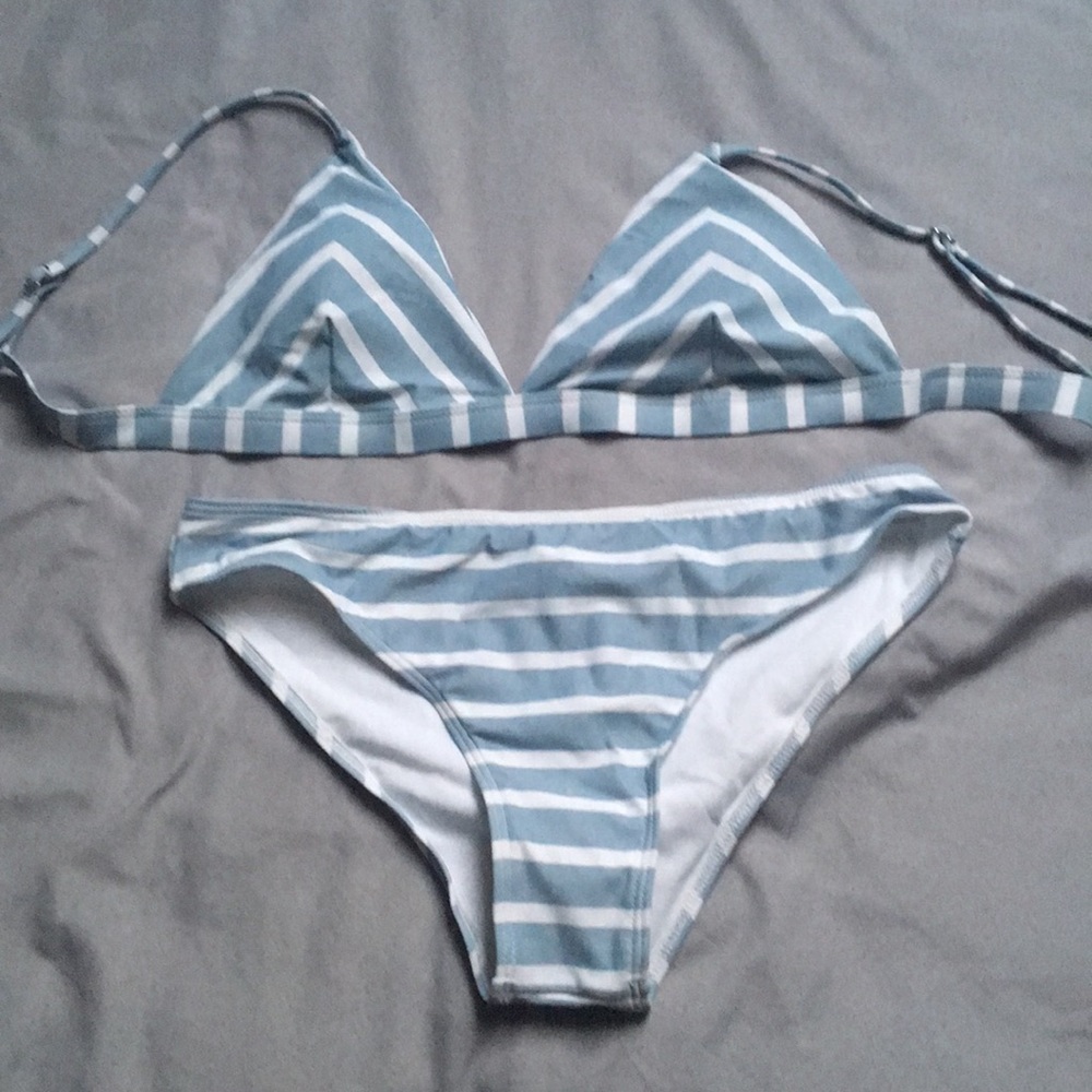 White and light blue gray colored bathing suit.
